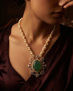 Opalescent Bead Carved Green Medallion Necklace